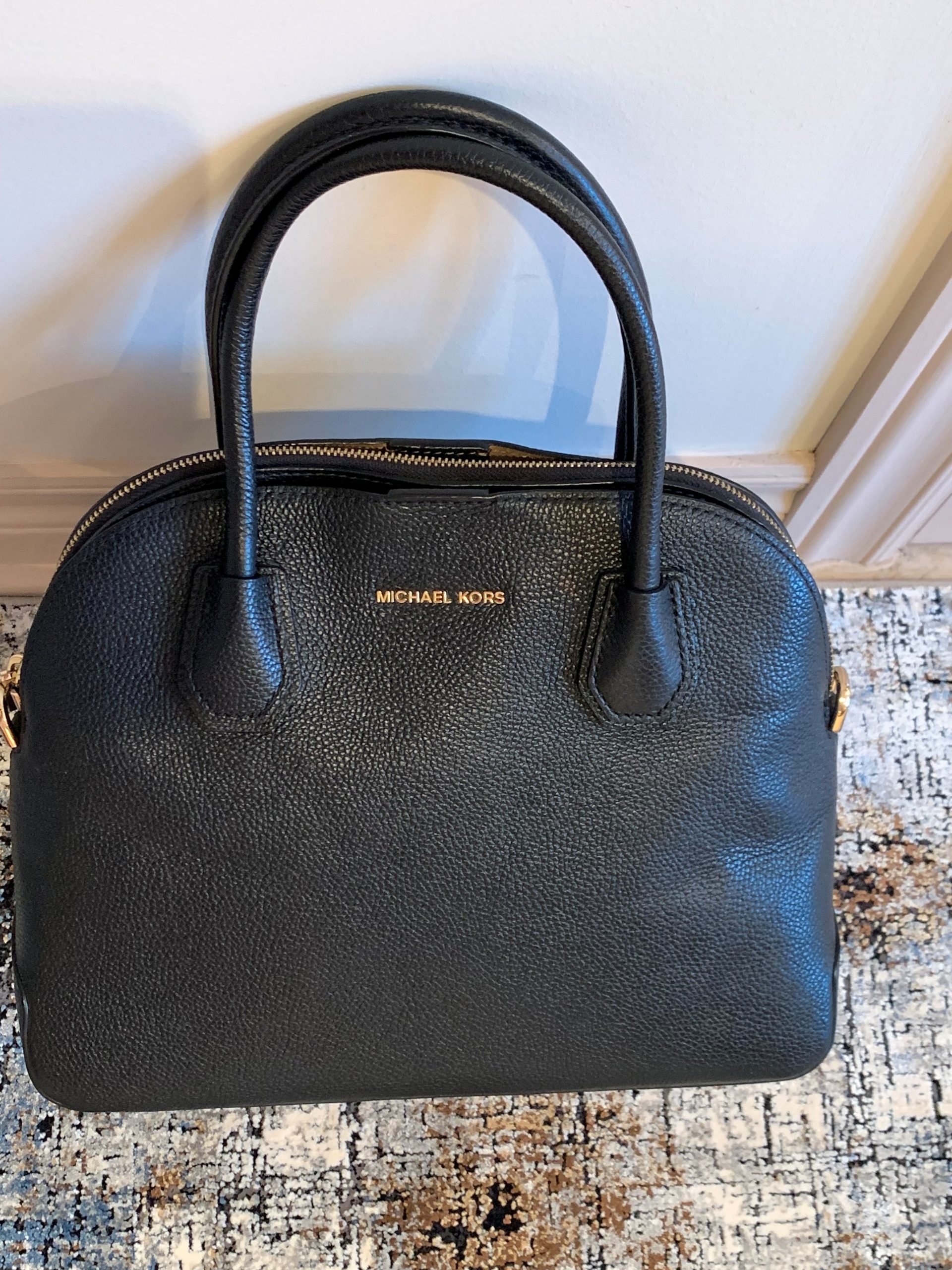 Sacoche Sac à main en cuir noir Michael Kors.